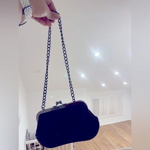 Black glitter cocktail clutch bag